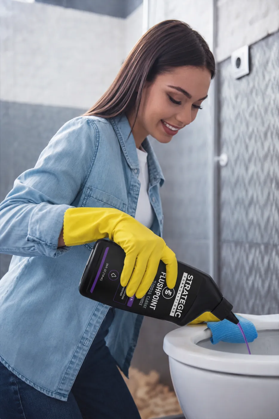 Running FLUSHPOINT gel around the rim of a toilet bowl